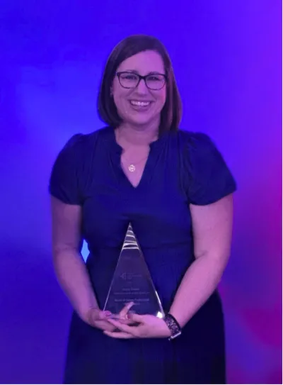 Kayla Eitreim accepting JA MVP award on stage